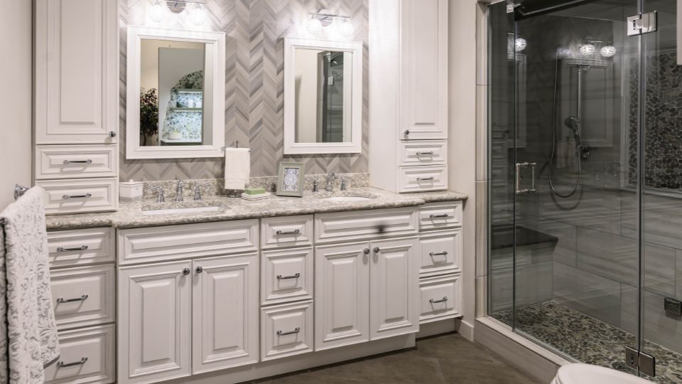 Schnaitman's Flooring America bathroom showroom with different tiles and custom shower